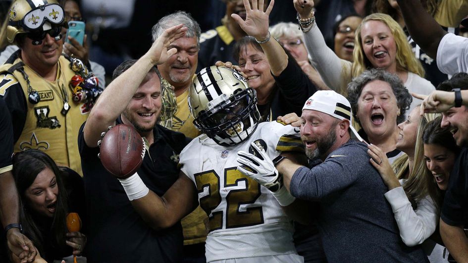 Mark Ingram celebrates with the New Orleans Saints fans