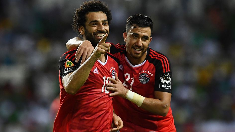 Mo Salah (left) celebrates with Egypt team-mate Mahmoud Hassan