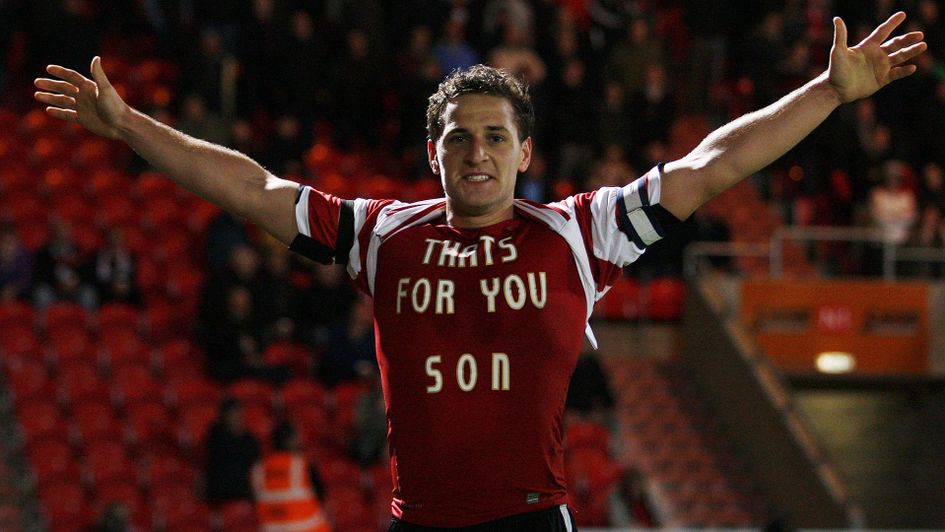 Billy Sharp reveals the message under his shirt