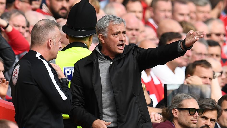 Jose Mourinho debates a decision