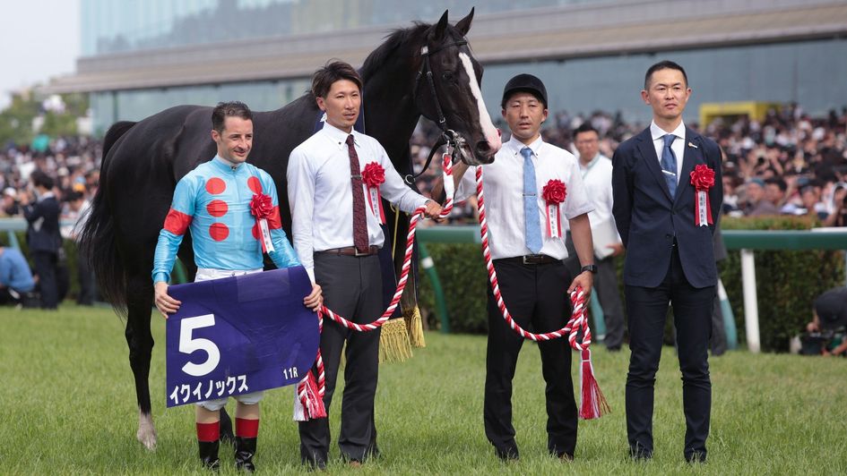 Tetsuya Kimura (right) trained Equinox, the world's highest-rated racehorse