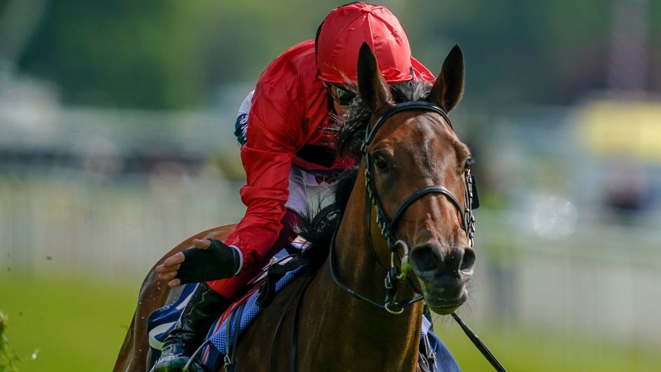 Emily Upjohn gets a pat down the neck from Frankie Dettori