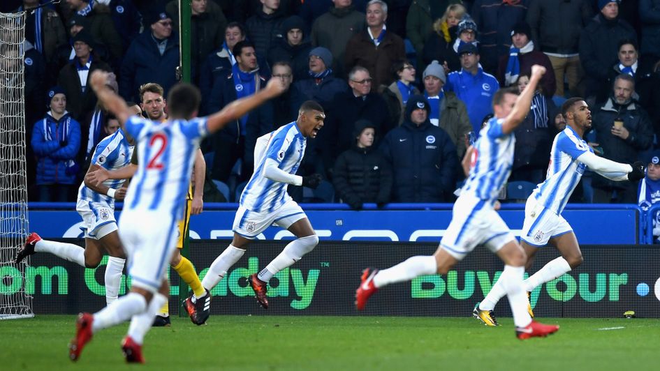 Steve Mounie and Huddersfield celebrate