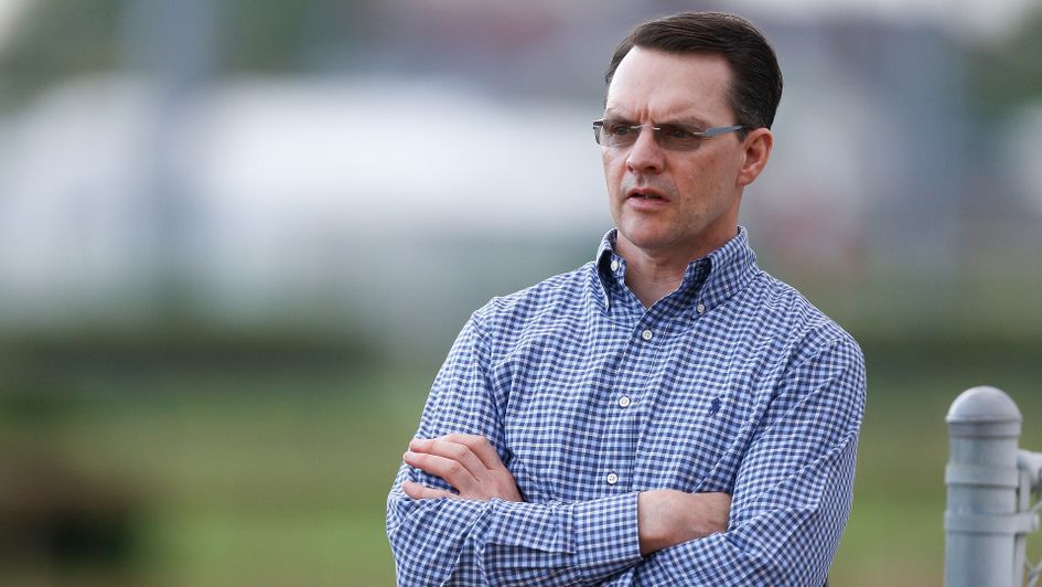 Trainer Aidan O'Brien watches Mendelssohn going through his exercise