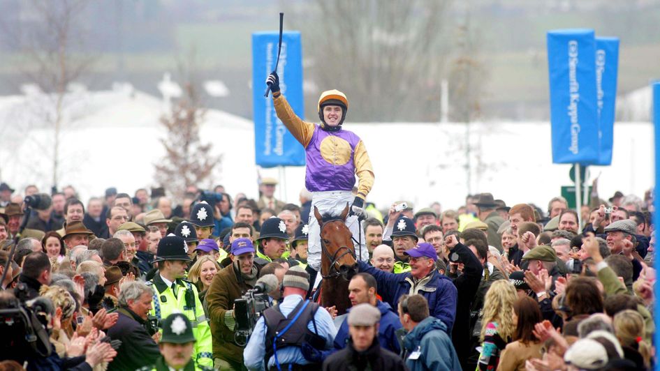 AP McCoy celebrates his 2006 win on Brave Inca in the Champion Hurdle