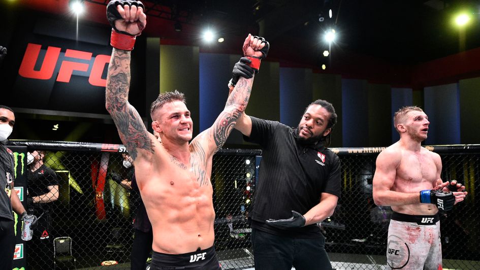 Dustin Poirier celebrates his victory