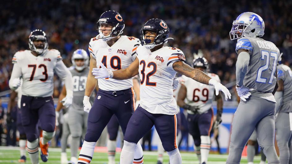 The Chicago Bears celebrate beating the Detroit Lions in the NFL