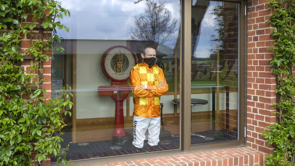 Jockey Jamie Spencer peers out of the York weighing room