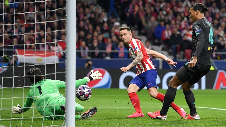 Saul Niguez gives Atletico an early lead against Liverpool in the Champions League last 16 first leg
