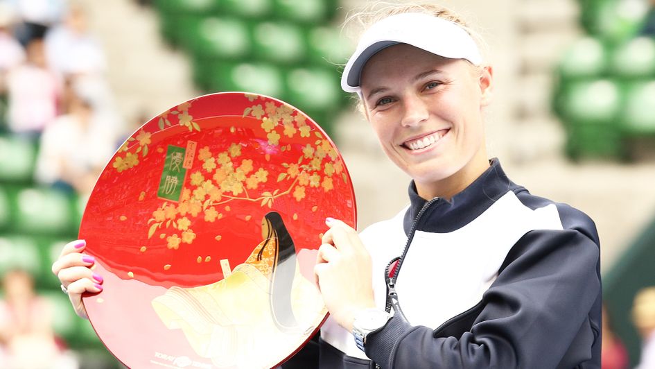 Caroline Wozniacki celebrates winning the Toray Pan Pacific Open