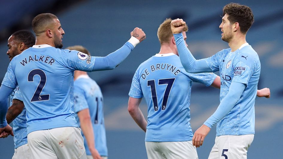 John Stones celebrates a goal for Manchester City