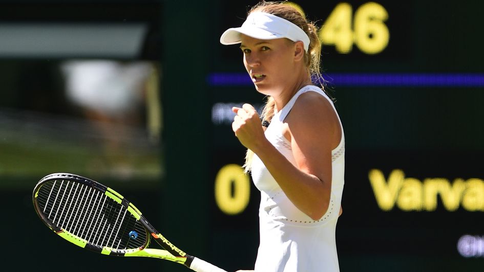 Caroline Wozniacki celebrates after her first round victory at Wimbledon
