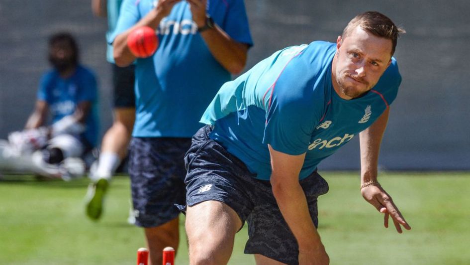 Ollie Robinson practices with the pink ball