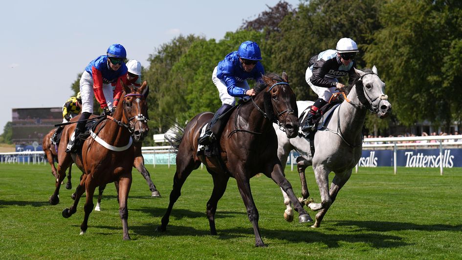 Valedictory (centre) wins from the grey Roaring Legend at Newmarket