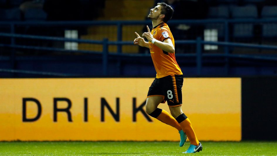 Ruben Neves celebrates opening the scoring