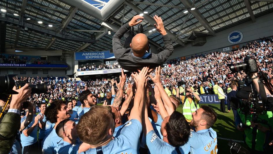 Manchester City celebrate after winning the Premier League