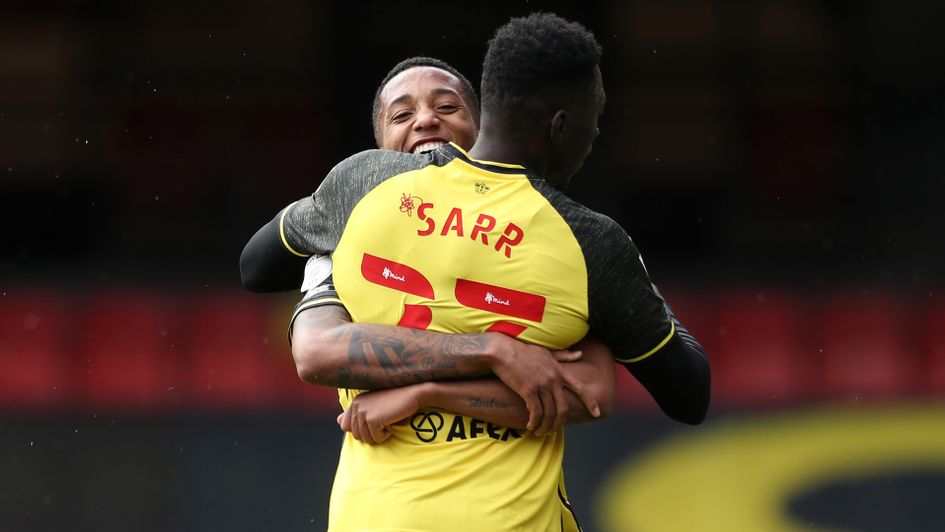 Joao Pedro celebrates with Ismaila Sarr