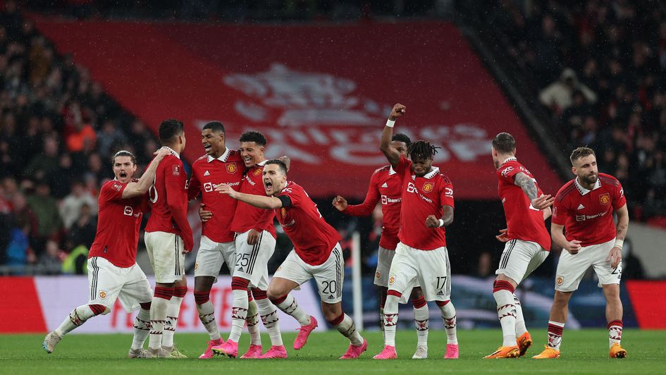 Manchester United celebrate their penalty shootout victory over Brighton