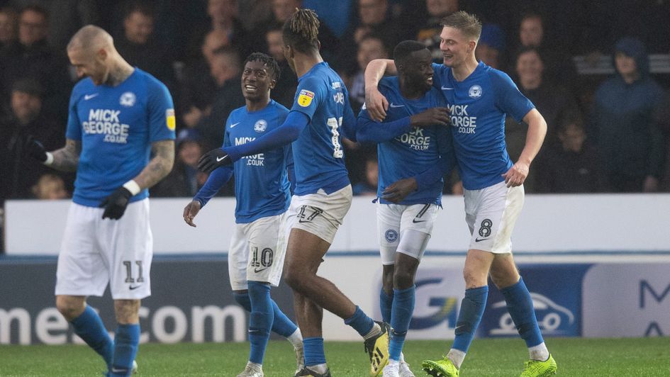 Peterborough celebrate a Mohamed Eisa goal