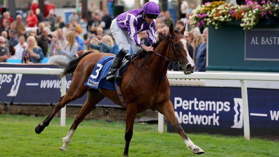 Minnie Hauk wins the Yorkshire Oaks under Ryan Moore