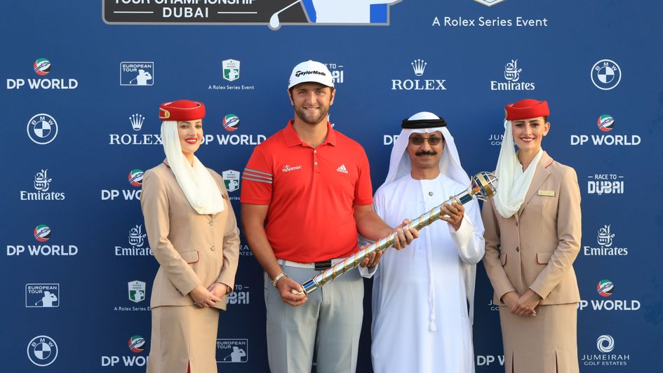 Jon Rahm receives the trophy