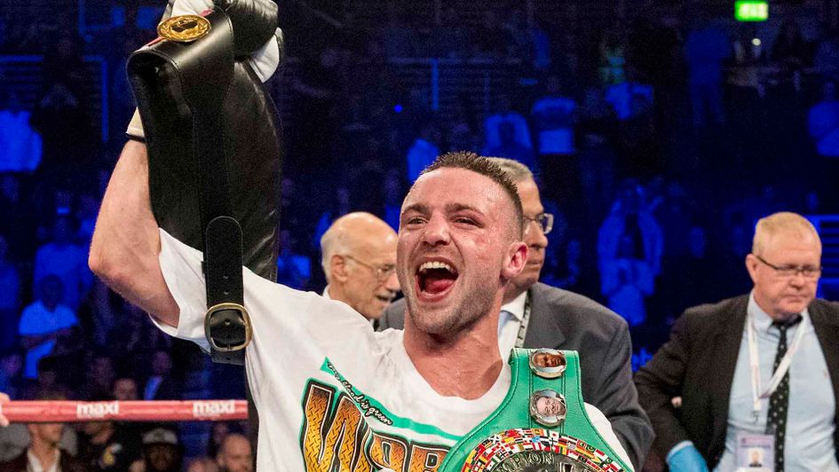 Josh Taylor celebrates