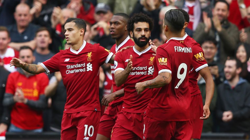 Mohamed Salah celebrates with his Liverpool team-mates