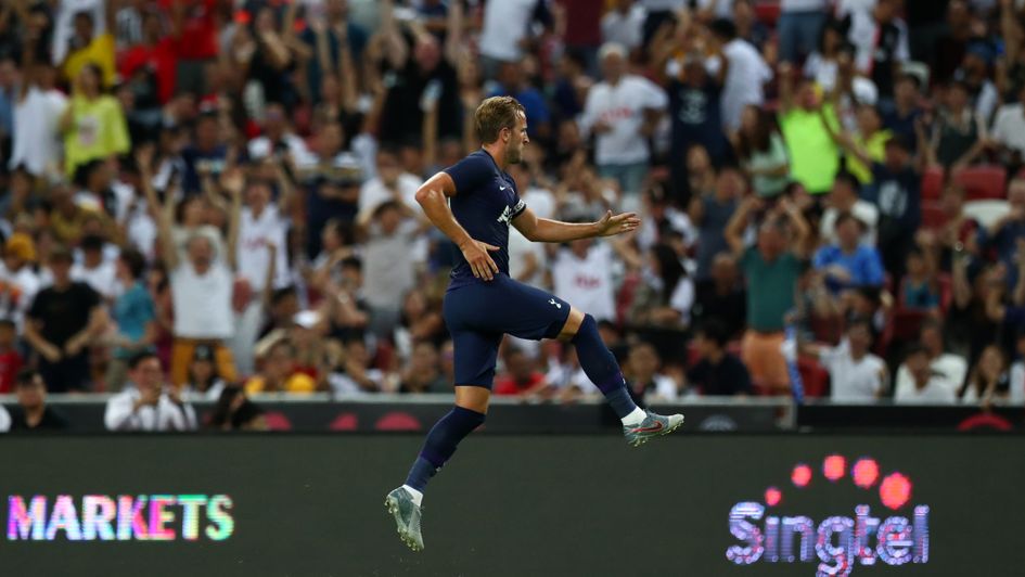 Harry Kane: Tottenham forward celebrates his stunning goal from the halfway line in pre-season against Juventus