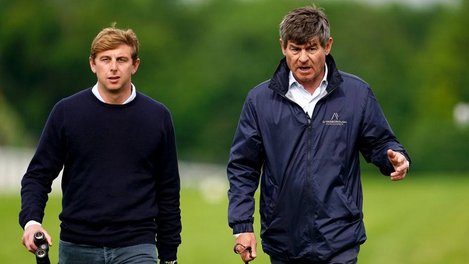 Simon (right) and son Ed Crisford pictured at Epsom Downs