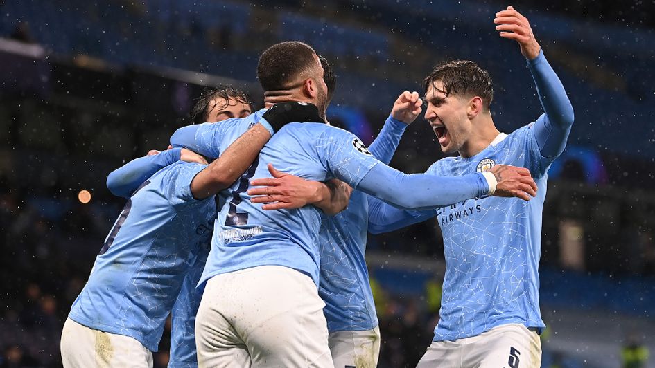 Manchester City celebrate Riyad Mahrez's second goal against PSG