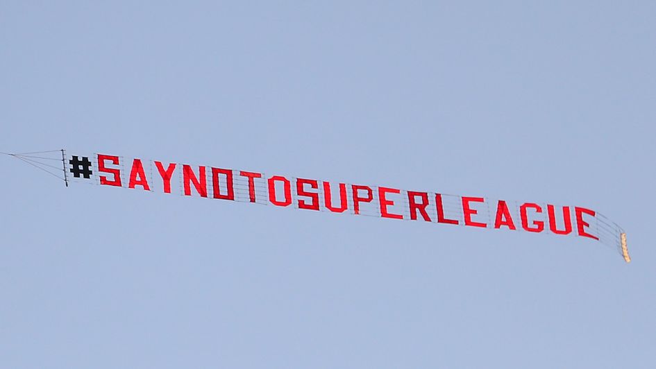 A banners is flown in protest over Leeds United's Elland Road ground