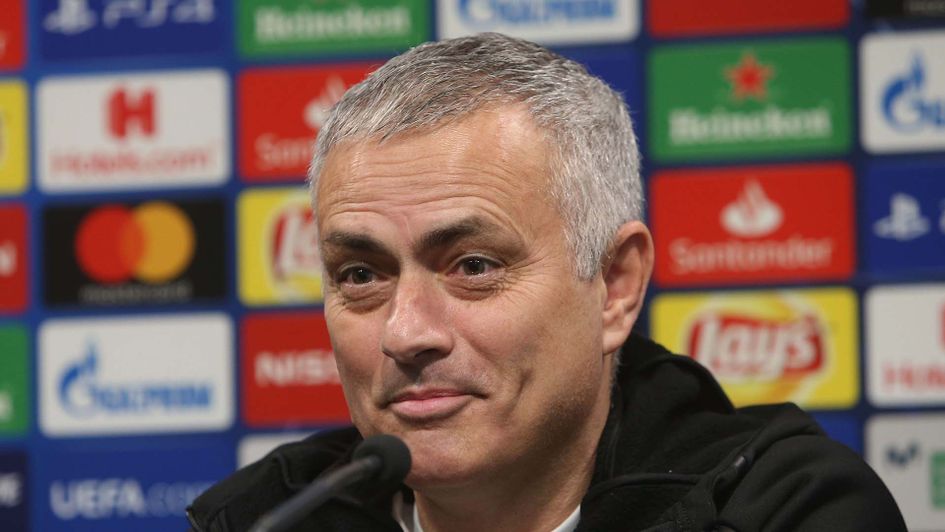 Tottenham boss Jose Mourinho talks to the media