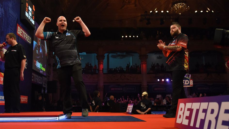 The moment Rob Cross won the World Matchplay final against Michael Smith (Picture: Lawrence Lustig/PDC)