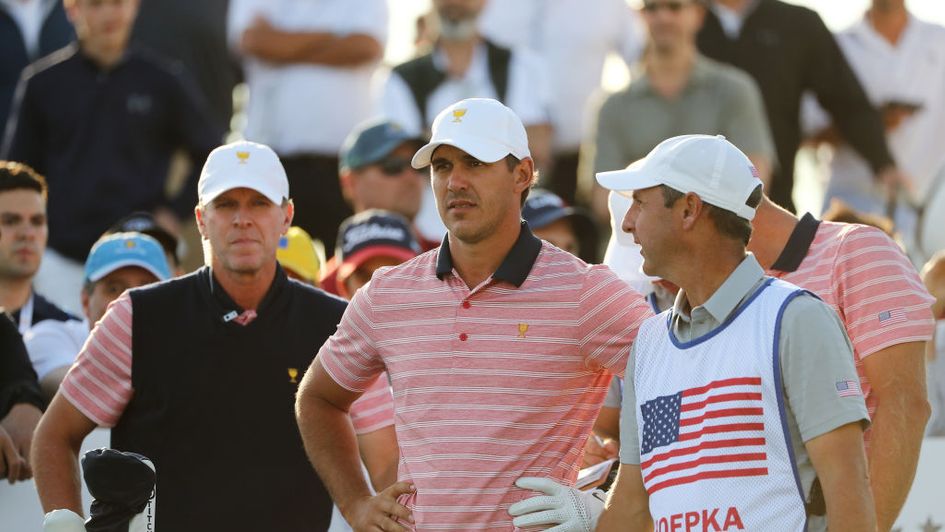 Steve Stricker (left) and Brooks Koepka (centre)