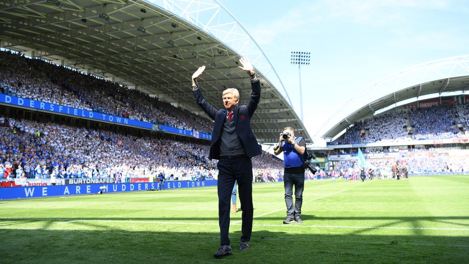 Arsene Wenger waves goodbye