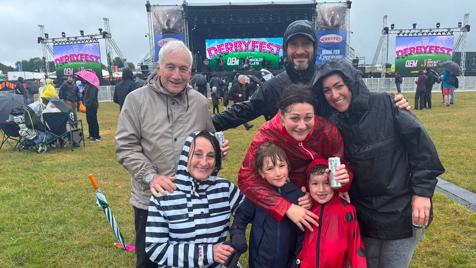 Some left early but many who braved the Hill, including the Gomez family, did not let the weather dampen their spirits