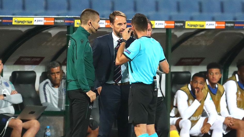 Gareth Southgate in discussion with referee Vasil Levski
