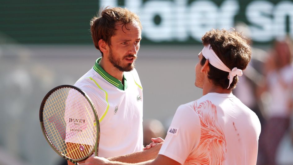 Daniil Medvedev shakes hands with Thiago Seyboth Wild