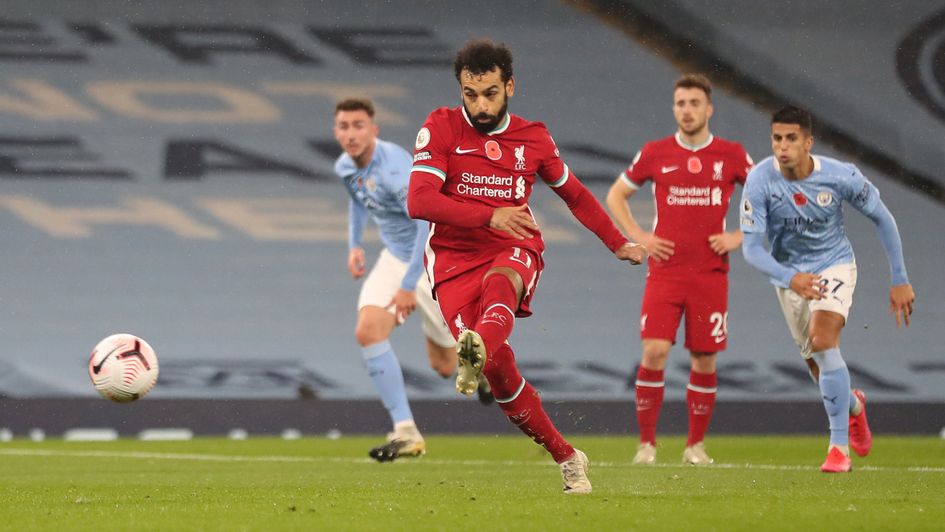 Liverpool's Mo Salah scores a penalty against Manchester City