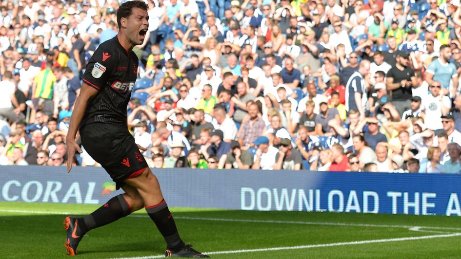 Yanic Wildschut celebrates after scoring Bolton's opening day winner at West Brom