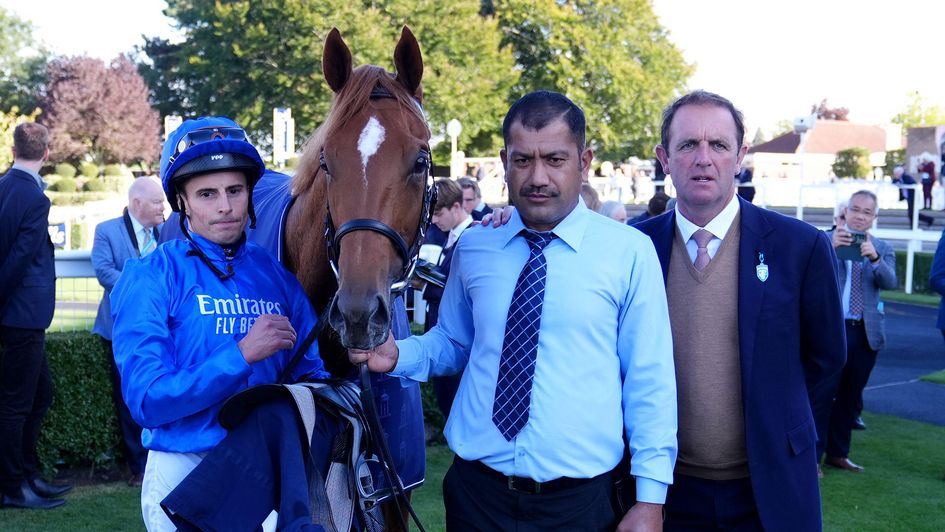 Distant Storm with connections after winning the Tattersalls Stakes at Newmarket