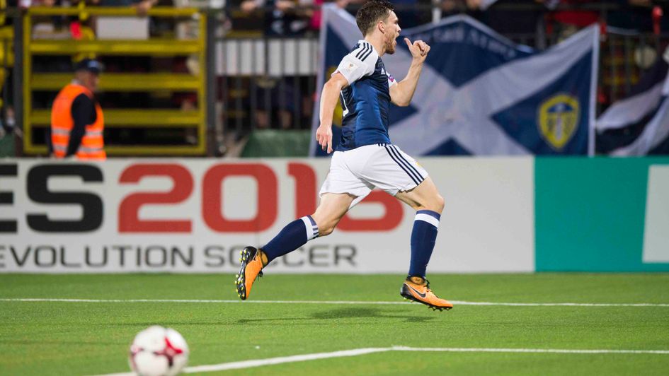 Andy Robertson celebrates