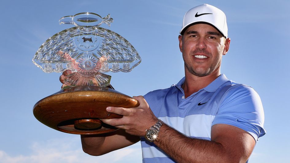 Brooks Koepka with the Phoenix Open trophy