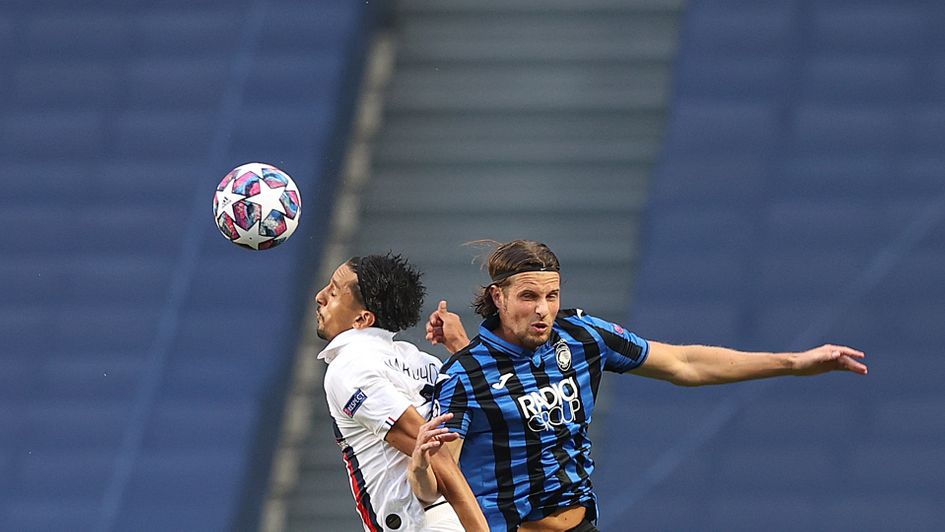 Marquinhos and Hans Hateboer battle for the ball