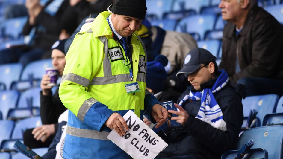 A Leicester fan has a sign confiscated ahead of their clash with Southampton