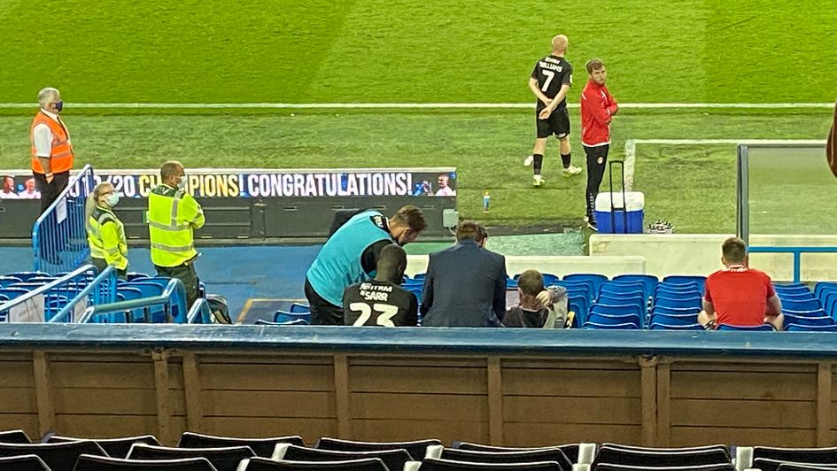 Charlton players watch the final moments of Brentford's game with Barnsley