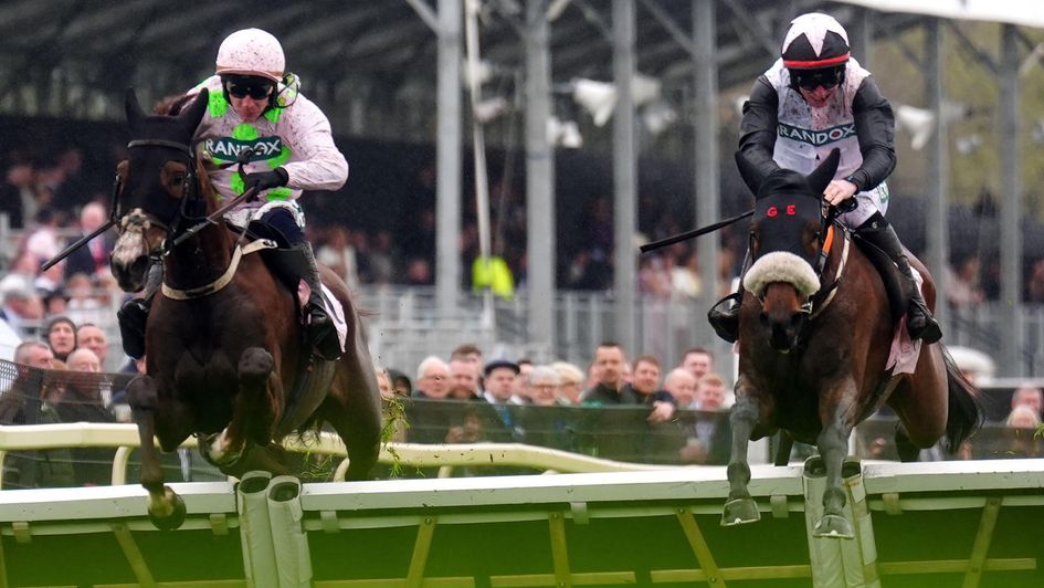 Mange Tout (right) beats Selma De Vary in the opening race at Aintree