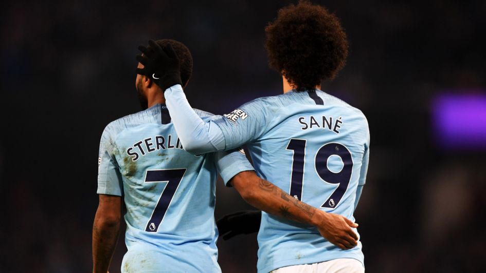 Leroy Sane (right) celebrates his goal for Manchester City against Liverpool