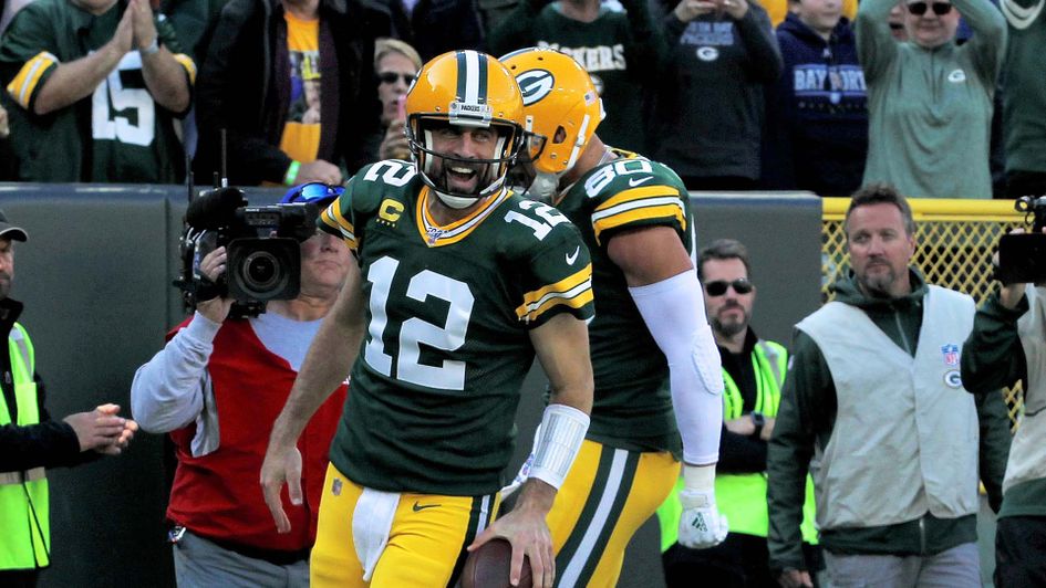 Green Bay Packers quarterback Aaron Rodgers celebrates