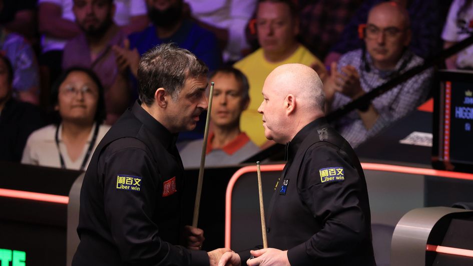 Ronnie O'Sullivan congratulates John Higgins after their epic last-16 encounter